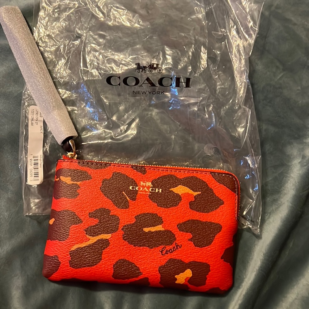 NWT Coach pink leopard wristlet